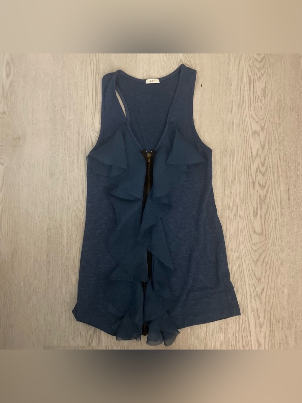Navy blue sleeveless ruffle zip-front tank top